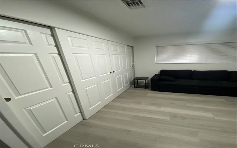 large closet in guest bedroom