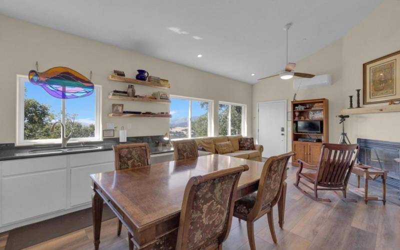 The kitchen flows into the living dining space.