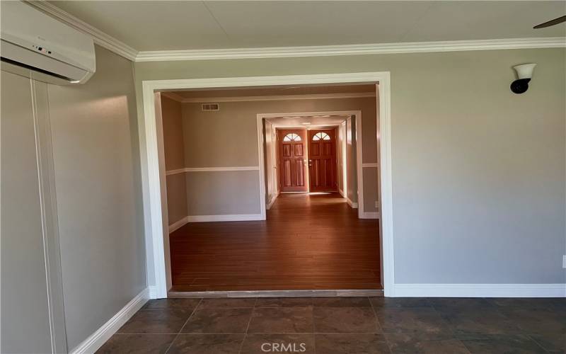 Looking into Formal Dining Room from Enclosed Dining Room