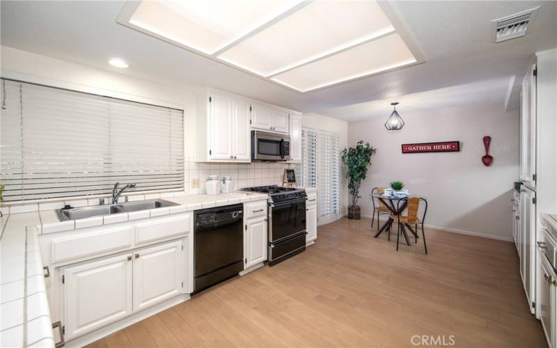 BREAKFAST NOOK VIEW WITH SLIDING DOOR OUT TO REAR PATIO