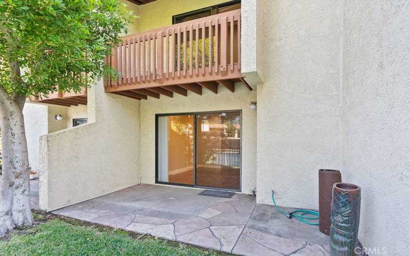 Expansive patio for BBQ & lounging areas.