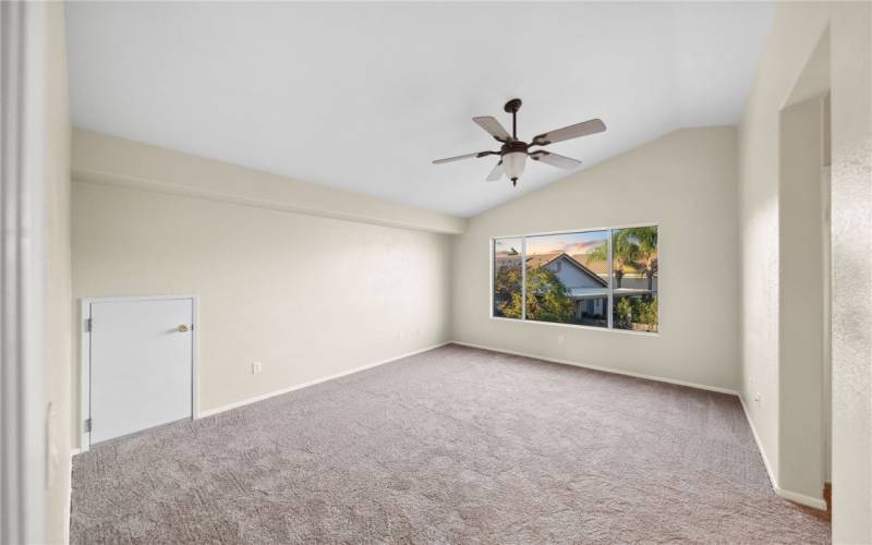 Primary Bedroom with attic storage door