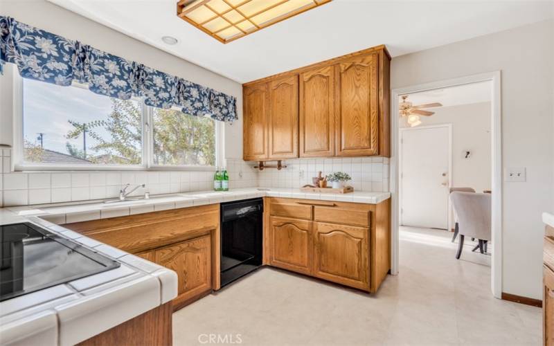 Kitchen window provides lots of natural light as well as a view of the outside while preparing your meals