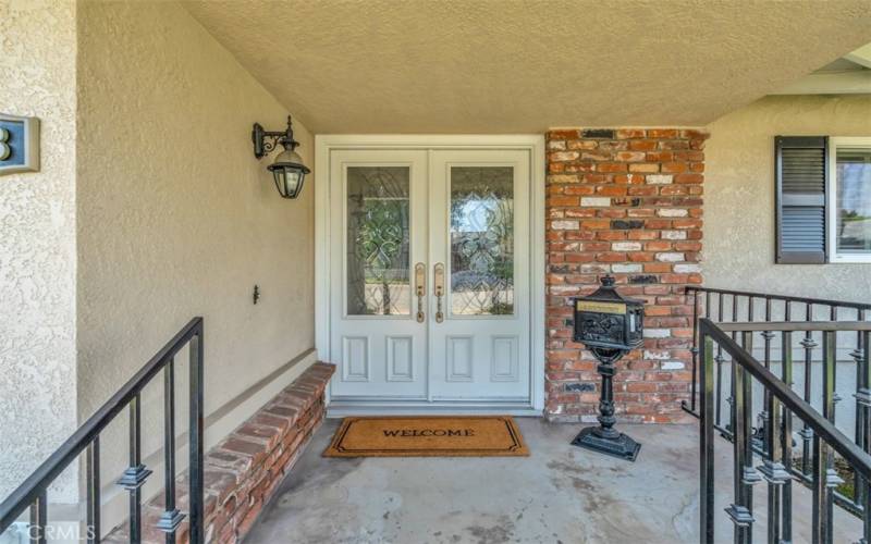 Inviting double door entry also serves as an impressive exterior focal point