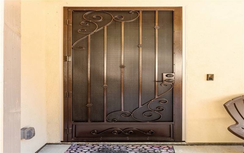 Custom made iron security screen door.