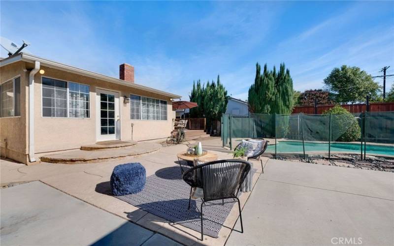 Large Back patio area with fenced pool/spa