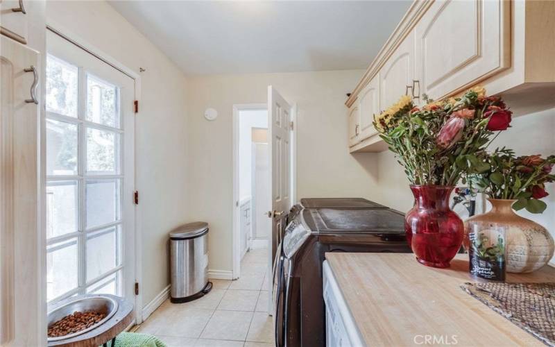 Roomy Laundry Room with plenty of storage and light