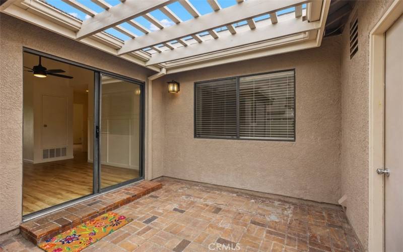 Patio between the home and garage.