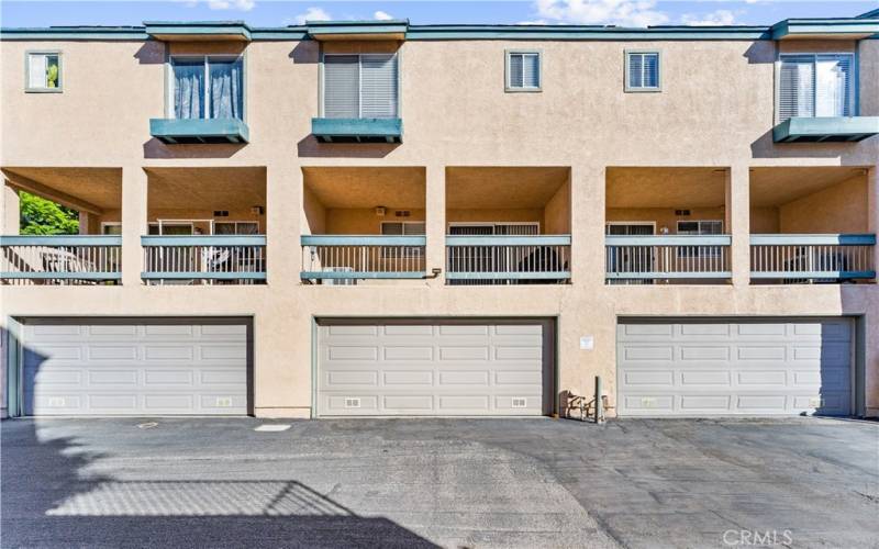 Garage access with 2 car garage and large covered Balcony above