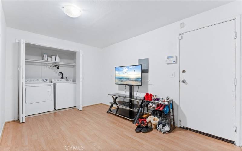 Utility Room with Laundry hookups. Room is off garage and provides additional space for storage or other creative needs