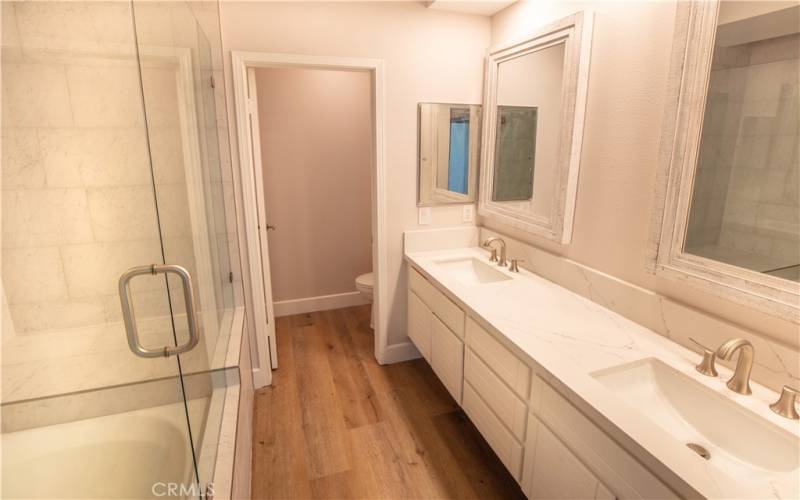 COMPLETELY REMODELED MASTER BATH WITH QUARTZ COUNTERS