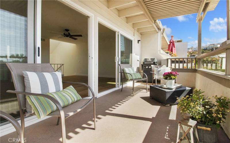 Peaceful ocean and hill views from the deck off Living Room