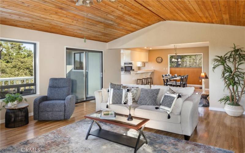 View of kitchen and dining area from corner of living room.