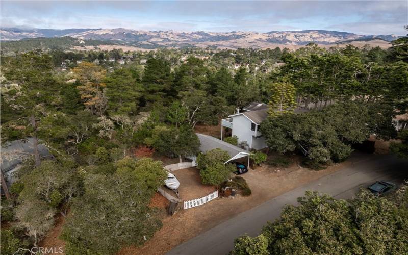 Higher view of property showing view of hills as well.