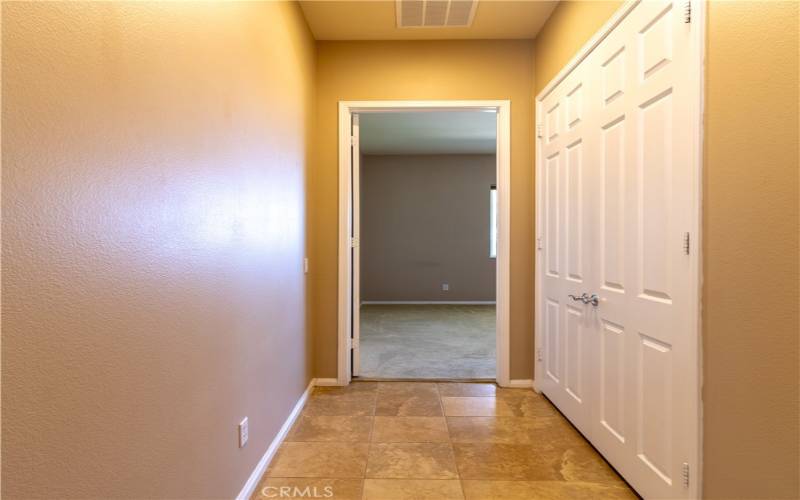 Hallway leading to bedroom.