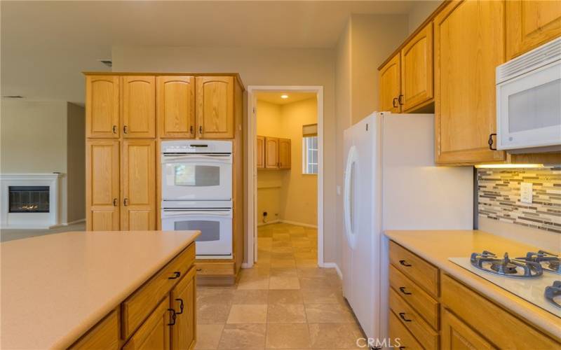 Kitchen area with view laundry.