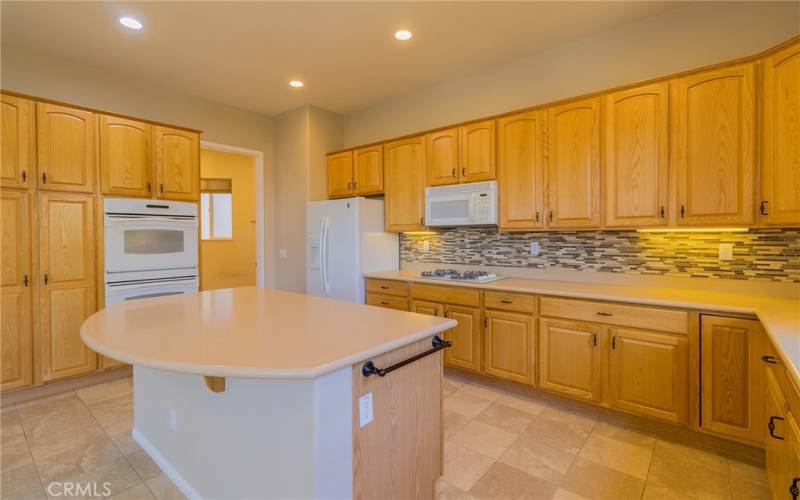 Laundry with pantry and deep sink.