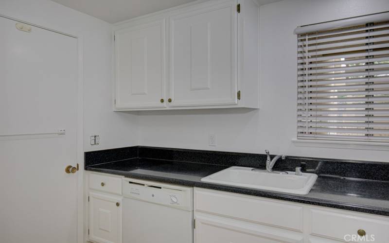 The nice fresh paint makes this kitchen ready for you to move right in.