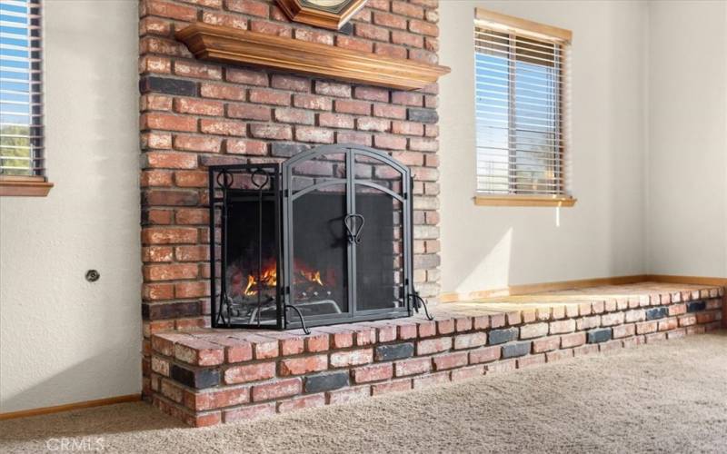 Fire in the fireplace is virtual fire. Buyer to verify if fireplace is functional 
