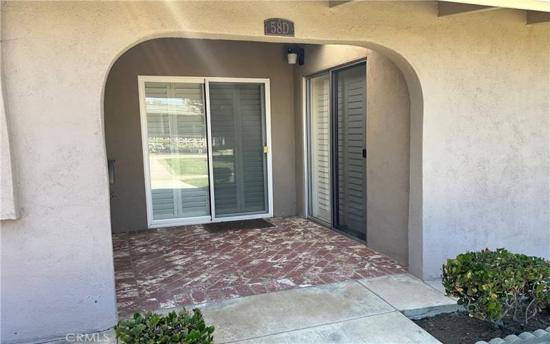 Sliding glass doors in both living room and primary bedroom.  Newer vinyl double pane - gives extra light and fresh air!