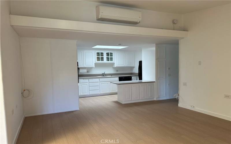 View into kitchen. Note mini split a/c and heat