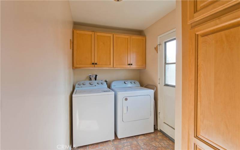 Laundry off of the Kitchen. Washer & Dryer included in the sale.