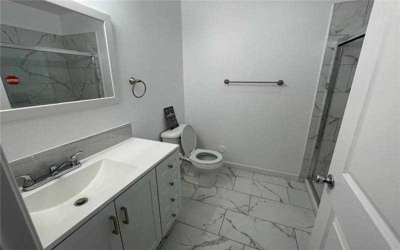 Newly remodeled bathroom. Shared with one other tenant.