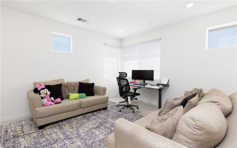 upstairs loft/TV area