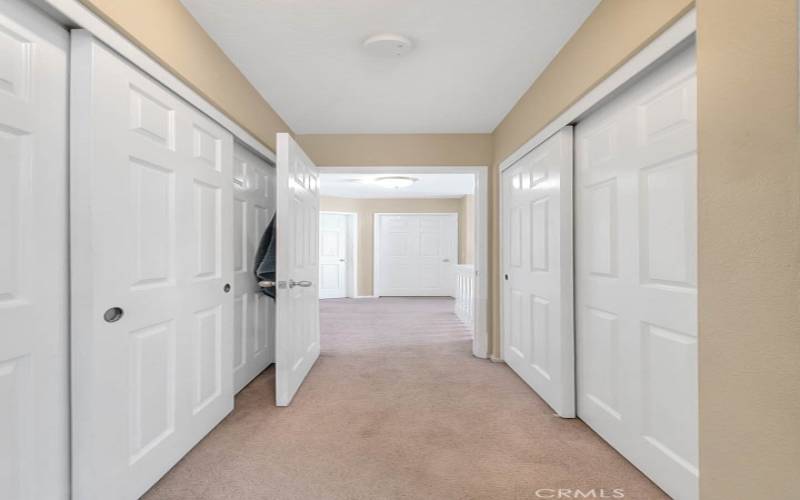 Dual closets in primary bedroom