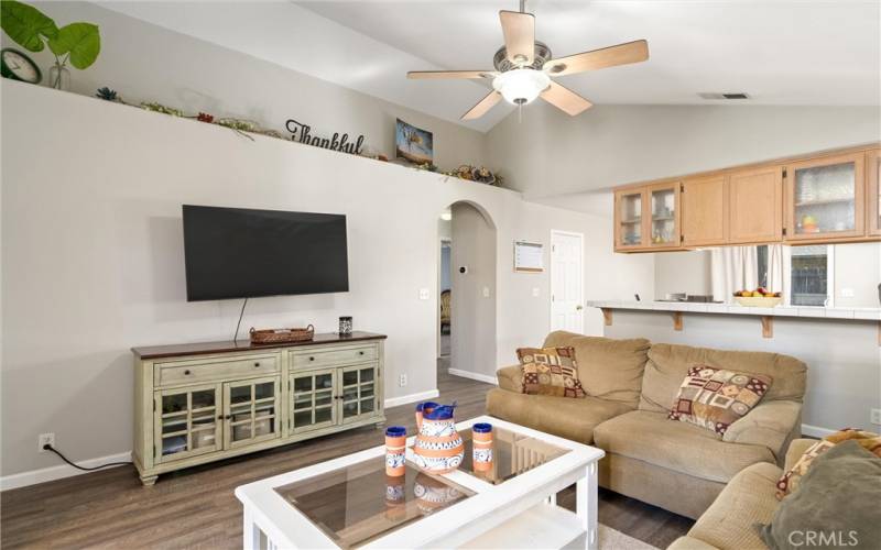 Living room with entrance to hallway