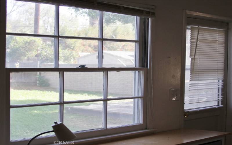 kitchen window and back door to backyard