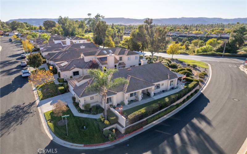 View of your corner house with proximity to the golf course.