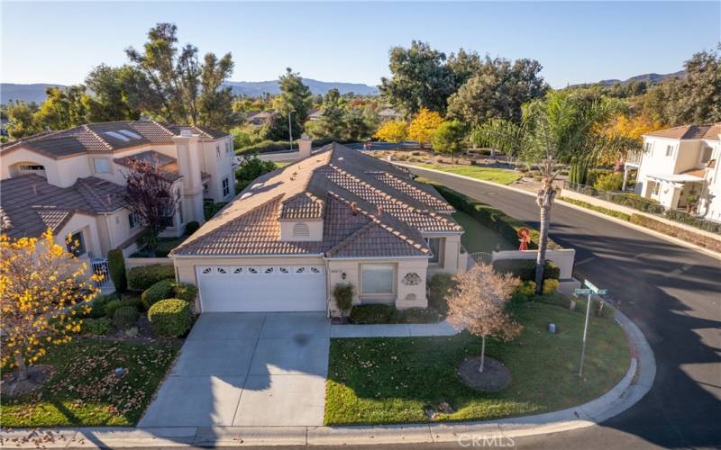 Beautiful corner location with only one neighbor and lots of lush greenery.