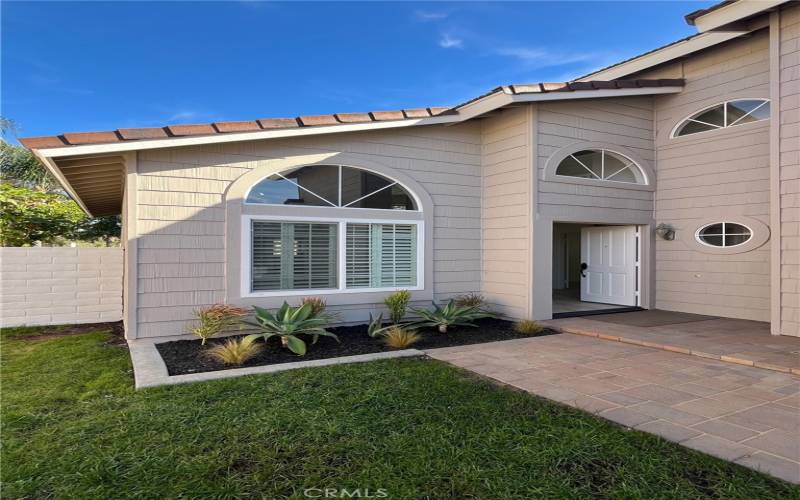 Beautiful walk up entry, with pavers. Double Door Entry.