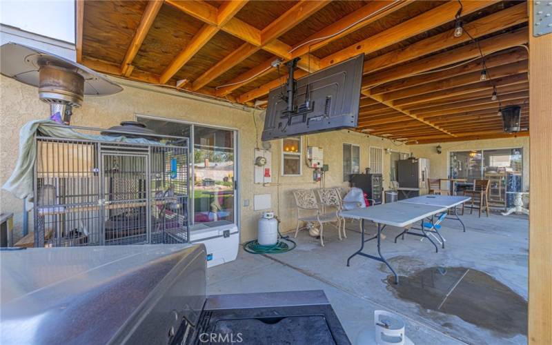 COVERED PATIO WITH TV.