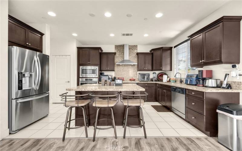 breakfast bar and oversized kitchen.