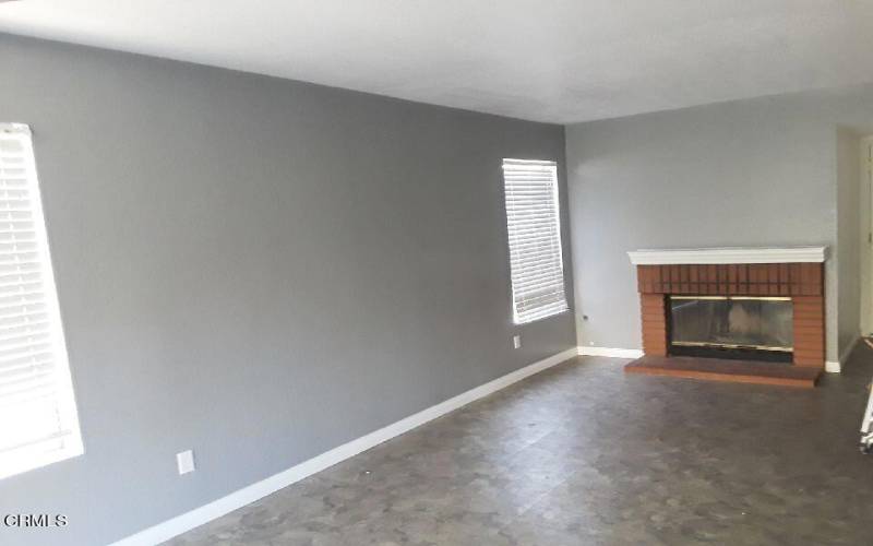 Family Room with Fireplace and Windows!