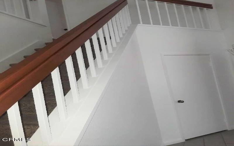 Stairs and Coat Closet