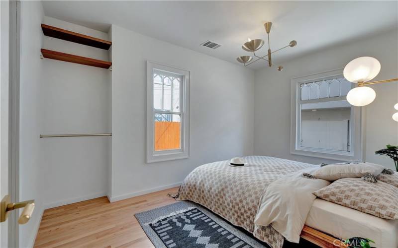 Bedroom 2 with bathroom en-suite and awesome light fixtures and vintage windows