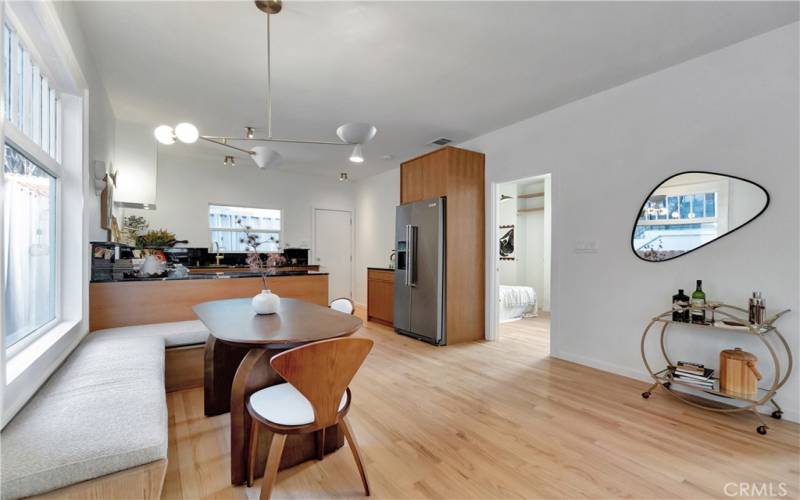 Dining area with custom built-in bench by the window