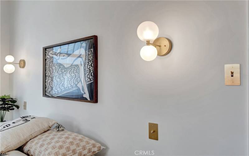 Custom light fixtures with dimmable brass light switches