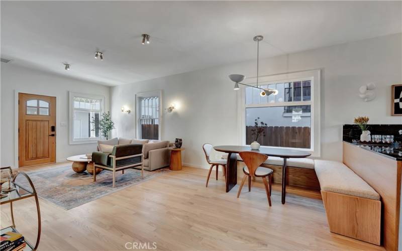 Dining area with custom built-in bench by the window