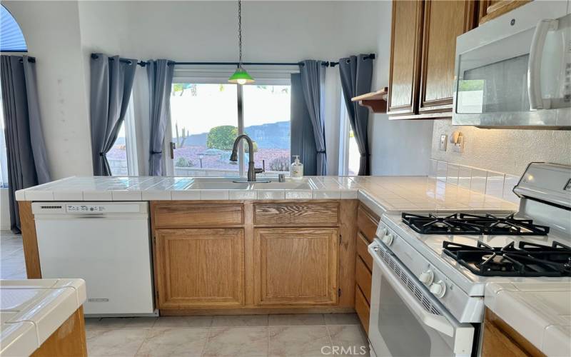 Kitchen toward Dining Nook & Patio