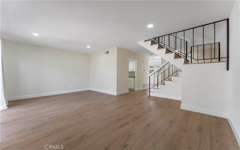 Living room to entrance, bathroom and kitchen.