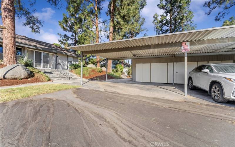 Two Parking stalls with cabinets close to unit.