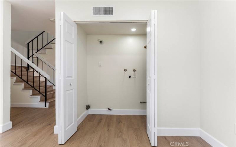 Laundry area off kitchen.