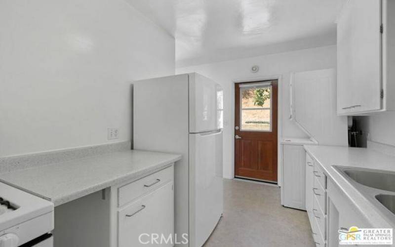 Owner will remodel kitchen and make it like unit next door if prefered