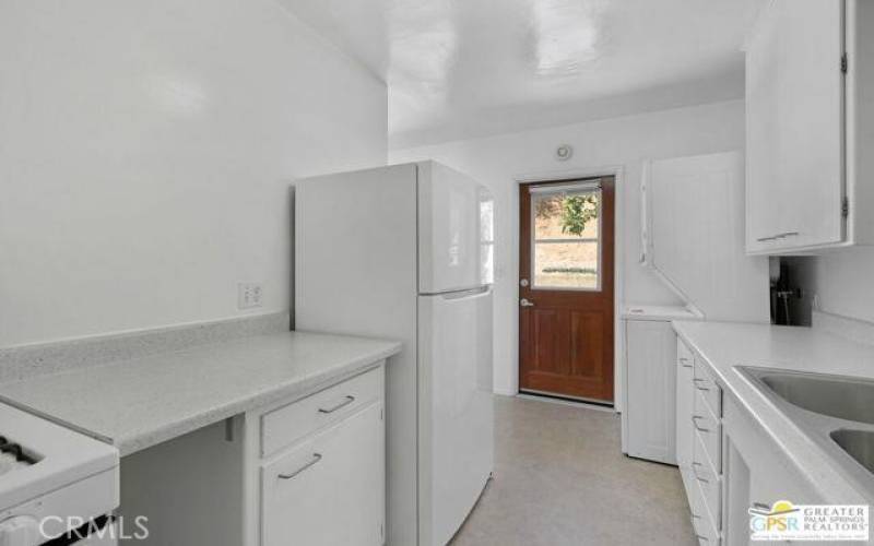 Owner will remodel kitchen and make it like unit next door if prefered