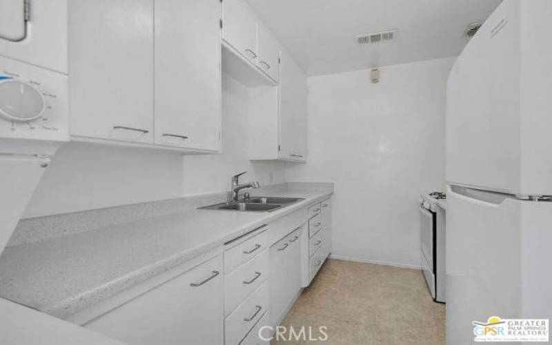 Owner will remodel kitchen and make it like unit next door if prefered