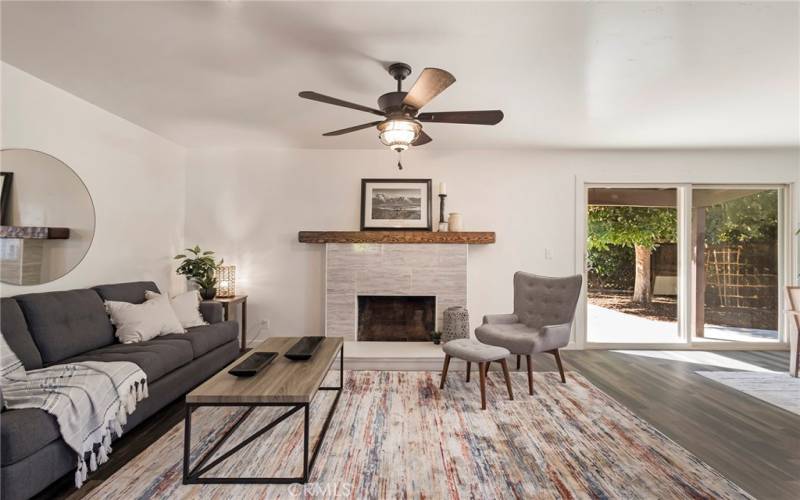 Living room in main house with fireplace